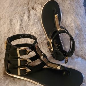 Black and Gold Gladiator Sandal- Fergie
